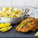 Combination Of Pork Schnitzel With The Tasty Potato And Mayonnaise Salad