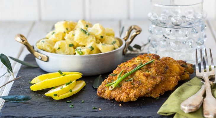 Combination Of Pork Schnitzel With The Tasty Potato And Mayonnaise Salad